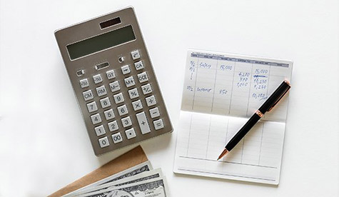 A calculator and a checkbook