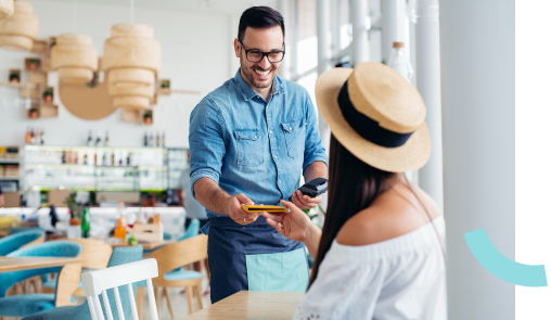 Server handing payment terminal to customer