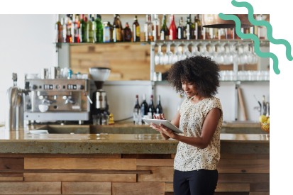 Woman using TouchBistro in her restaurant