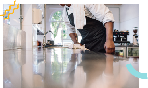 A chef cleaning his kitchen